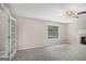Spacious living room with neutral paint, ceiling fan, marble fireplace, and plush carpet at 1085 Crown River Pkwy, Mcdonough, GA 30252