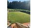 Large grassy backyard with partial fencing at 2681 Mariner Way, Villa Rica, GA 30180