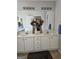 Bathroom featuring double sink vanity with ample counter space and a large mirror at 2681 Mariner Way, Villa Rica, GA 30180