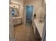 Bathroom with double sink vanity and an open doorway to toilet at 2681 Mariner Way, Villa Rica, GA 30180