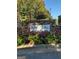 Mirror Lake community sign surrounded by bright flowers at 2681 Mariner Way, Villa Rica, GA 30180