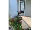 Inviting front porch with flower accents providing a warm welcome to this charming home at 2681 Mariner Way, Villa Rica, GA 30180