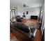 Spacious living room with fireplace and hardwood floors, perfect for relaxing or entertaining at 2681 Mariner Way, Villa Rica, GA 30180