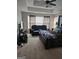Relaxing primary bedroom retreat with sitting area, offering ample space and natural lighting at 2681 Mariner Way, Villa Rica, GA 30180