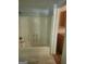 Full bathroom with a shower and tub combination with a shower head and controls at 4 Maple St, Porterdale, GA 30014
