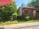 Exterior of home with siding, front porch, and green foliage at 4 Maple St, Porterdale, GA 30014