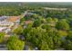 Expansive aerial view of the neighborhood, highlighting lush greenery and community features at 362 Highway 113, Temple, GA 30179
