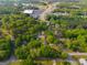 Aerial view of the neighborhood, showcasing the home and surrounding commercial area at 362 Highway 113, Temple, GA 30179