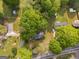 Aerial view of the neighborhood, showcasing the home and surrounding trees at 362 Highway 113, Temple, GA 30179