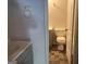 Modest bathroom with tile floor, toilet, and vanity at 9022 Homewood Dr, Riverdale, GA 30274