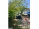 View of the backyard with sparse vegetation, showing the lot dimensions and boundary lines at 3143 S West St, Covington, GA 30014