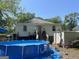 Backyard with an above-ground pool set up, offering a private outdoor recreation area at 3143 S West St, Covington, GA 30014