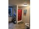 Bathroom features a shower with a Georgia Bulldogs-themed curtain at 3143 S West St, Covington, GA 30014