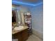 Bathroom with vanity, towels, and storage at 3143 S West St, Covington, GA 30014
