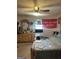 Primary bedroom featuring a ceiling fan, a window, and neutral-colored walls at 3143 S West St, Covington, GA 30014