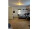 Bedroom featuring carpet, a window with a graphic, and neutral-colored walls at 3143 S West St, Covington, GA 30014