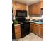 Functional kitchen featuring black appliances and plenty of storage at 3143 S West St, Covington, GA 30014