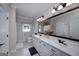 Bright bathroom with double vanity, granite countertops, and a large mirror for added convenience at 330 Noah Pl, Mcdonough, GA 30252