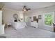 Serene bedroom with soft natural light, neutral walls and carpet, and views of the outdoors at 330 Noah Pl, Mcdonough, GA 30252
