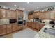 Modern kitchen with built-in appliances, ample counter space, and stylish cabinetry at 330 Noah Pl, Mcdonough, GA 30252