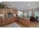 Well-appointed kitchen featuring stainless appliances, wooden cabinets, and a breakfast bar at 330 Noah Pl, Mcdonough, GA 30252