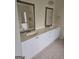 Bathroom with double sink vanity and plenty of storage space at 5114 Verbena Nw Dr, Acworth, GA 30102