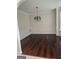 Elegant dining room featuring hardwood floors and classic chandelier lighting at 5114 Verbena Nw Dr, Acworth, GA 30102