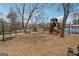 Community playground with swings, slides, and climbing structures at 5114 Verbena Nw Dr, Acworth, GA 30102