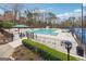 Community pool area with lounge chairs and picnic tables at 5114 Verbena Nw Dr, Acworth, GA 30102