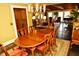 Dining room showcasing dining table with chairs, chandelier, and an area rug at 301 Spruill Bridge Rd, Temple, GA 30179