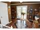 Entryway showcasing decorative tile flooring, a coat rack, and view to fenced backyard at 301 Spruill Bridge Rd, Temple, GA 30179