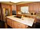 Well-equipped kitchen with stainless steel appliances, granite counters, and ample cabinet space at 301 Spruill Bridge Rd, Temple, GA 30179