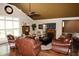 Inviting living room with fireplace, hardwood floors, and comfortable seating, perfect for relaxing at 301 Spruill Bridge Rd, Temple, GA 30179