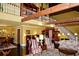 Living room with high ceilings, exposed wood beams, and dark wood floors at 301 Spruill Bridge Rd, Temple, GA 30179