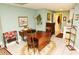 Bright living space with tile flooring, a dining area, and a glimpse into another room with its own features at 301 Spruill Bridge Rd, Temple, GA 30179
