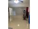 Spacious basement featuring light tile, and an elliptical at 1025 Lynwood Pl, Forest Park, GA 30297