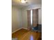 Cozy bedroom featuring hardwood floors, natural light, and neutral paint at 1025 Lynwood Pl, Forest Park, GA 30297