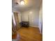 Cozy bedroom featuring hardwood floors, natural light, and neutral paint at 1025 Lynwood Pl, Forest Park, GA 30297