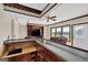 Wet bar with granite countertop opens to Gathering room with lake views at 513 Viridian Vw, Peachtree City, GA 30269