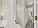 Bathroom doorway view with tile floors and partial vanity and toilet view at 513 Viridian Vw, Peachtree City, GA 30269