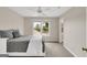 Neutral bedroom with a bed, ceiling fan, carpeted floor and a window with outside view at 513 Viridian Vw, Peachtree City, GA 30269