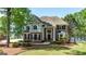 Spacious two-story home with a well-kept lawn and mature trees at 513 Viridian Vw, Peachtree City, GA 30269
