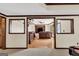 Open-concept home design showcasing a living area with a bar and built-in wooden shelving at 513 Viridian Vw, Peachtree City, GA 30269