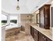 Main bathroom with jetted tub, double vanity, glass shower, and scenic view at 513 Viridian Vw, Peachtree City, GA 30269