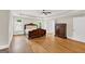 This main bedroom has natural light, hard wood floors, and decorative trim at 513 Viridian Vw, Peachtree City, GA 30269