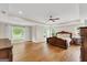 This main bedroom has a spacious layout with a large window and a decorative tray ceiling at 513 Viridian Vw, Peachtree City, GA 30269