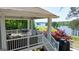 Outdoor living area with a view of the lake and golf course at 513 Viridian Vw, Peachtree City, GA 30269
