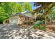 Charming two-story home with a brick facade, attached garage, and well-maintained landscaping at 2402 Creekside Trce, Jonesboro, GA 30236