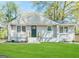 Charming single-story home with a well-manicured lawn and freshly painted exterior at 1962 Marvin Sw Ln, Atlanta, GA 30311