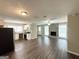 Expansive living area connects to the kitchen and features a cozy stone fireplace at 1962 Marvin Sw Ln, Atlanta, GA 30311
